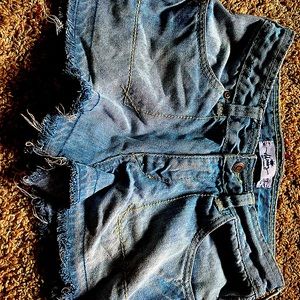 Old navy shorts with loose ripped bottoms